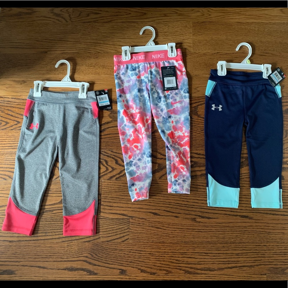 NWT Nike and UA cropped leggings, size 5 girls.